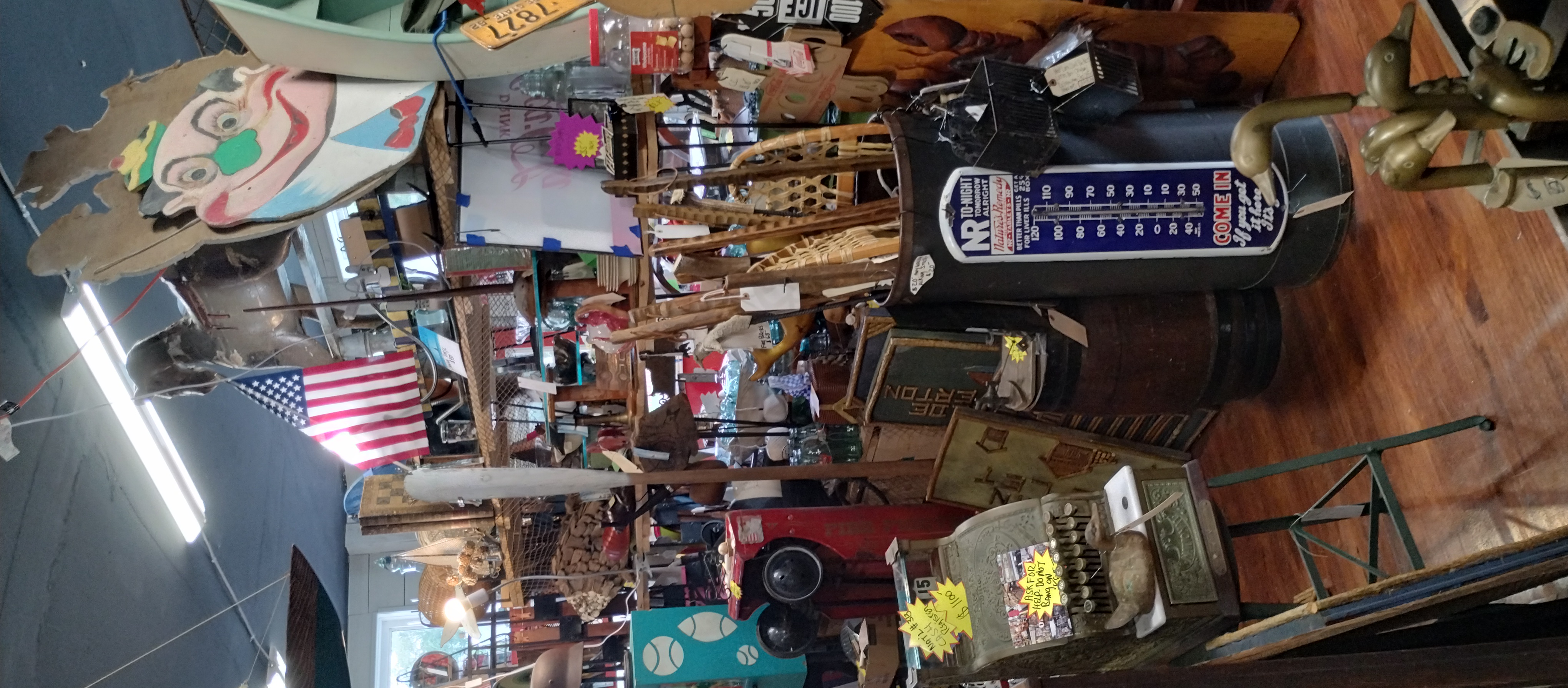 Shop interior with vintage thermometer and Americana collectibles