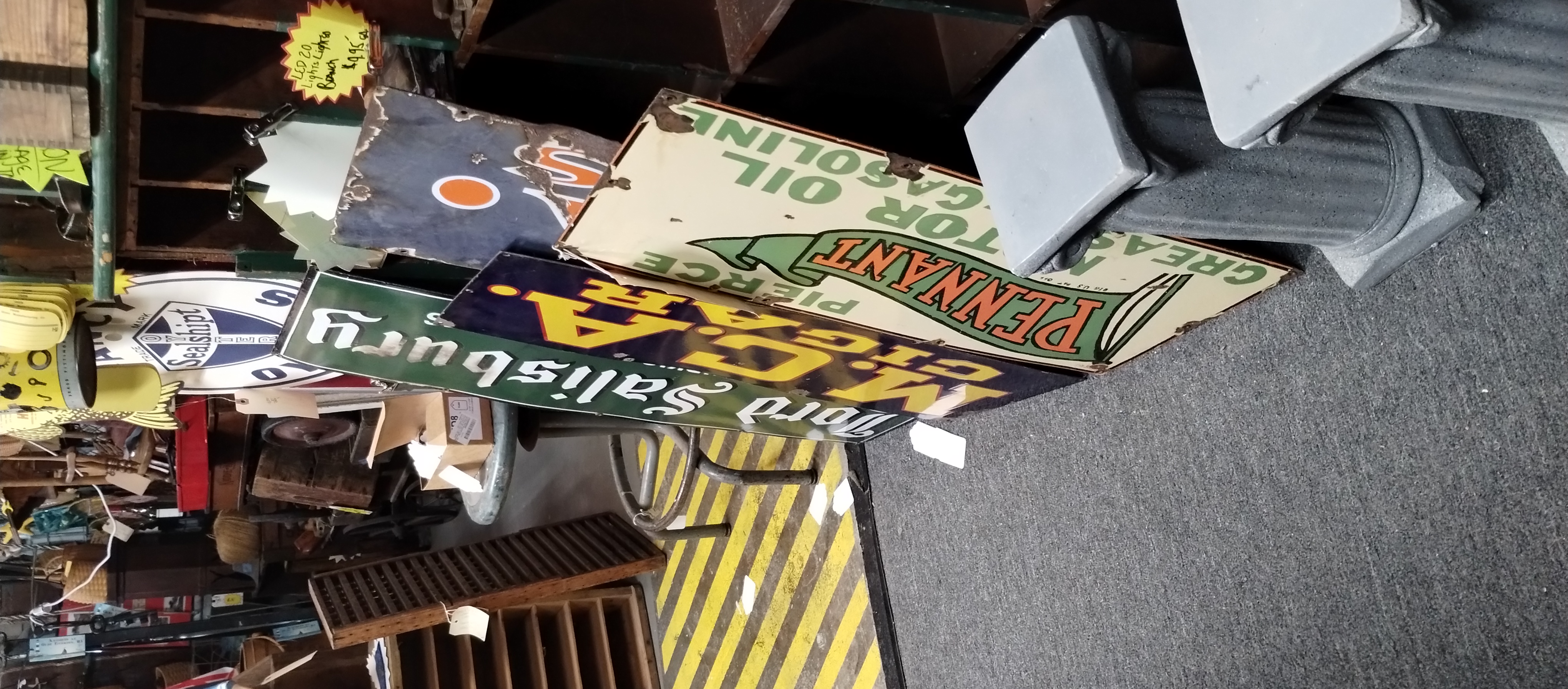 Antique signs, vintage tools, and collectibles